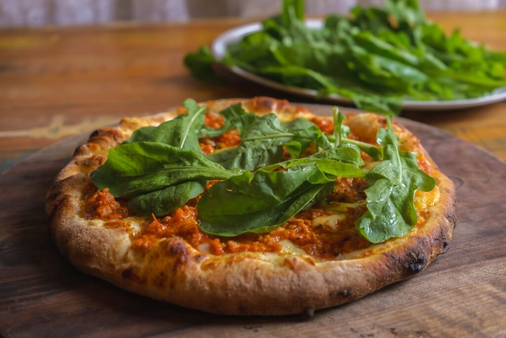 Pizza Palmeira com rúcula, receita da casa do Girassol